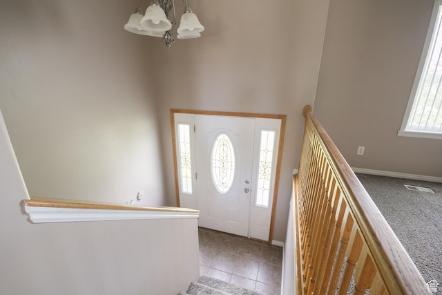 2349 W 1000 N, Vernal, UT 84078 - entryway featuring a chandelier, tile patterned flooring, and a high ceiling