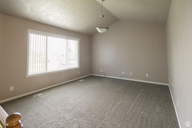 2349 W 1000 N, Vernal, UT 84078 - empty room with carpet floors and vaulted ceiling