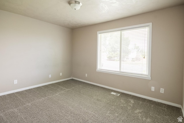 2349 W 1000 N, Vernal, UT 84078 - carpeted empty room with plenty of natural light