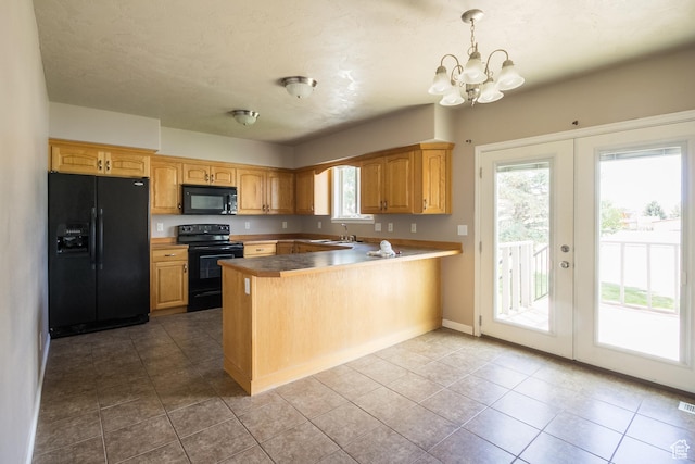 2349 W 1000 N, Vernal, UT 84078 - kitchen featuring black appliances, plenty of natural light, a peninsula, and a chandelier