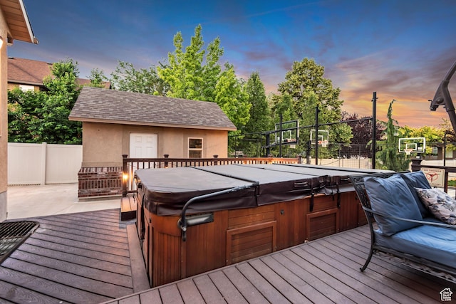 3065 W Current Creek Dr, South Jordan, UT 84095 - deck at dusk with a hot tub