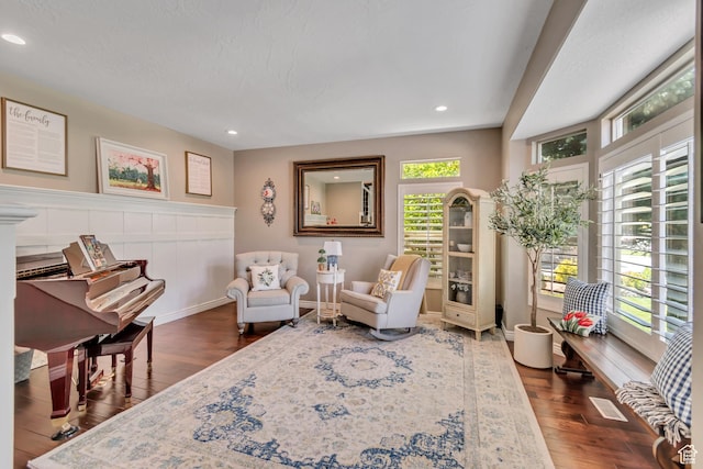 3065 W Current Creek Dr, South Jordan, UT 84095 - sitting room with dark wood finished floors, recessed lighting, and a wainscoted wall