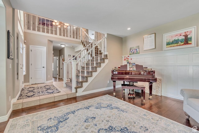 3065 W Current Creek Dr, South Jordan, UT 84095 - entrance foyer featuring wood finished floors, a chandelier, stairs, and recessed lighting