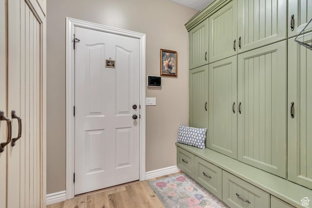 3065 W Current Creek Dr, South Jordan, UT 84095 - mudroom featuring light wood-type flooring and baseboards