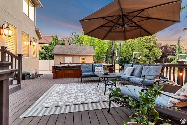 3065 W Current Creek Dr, South Jordan, UT 84095 - deck at dusk with a hot tub and an outdoor hangout area