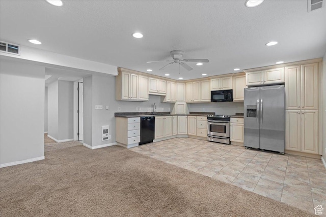 8022 S Deer Creek Rd E, Cottonwood Heights, UT 84121 - kitchen featuring black appliances, cream cabinetry, ceiling fan, light colored carpet, and recessed lighting