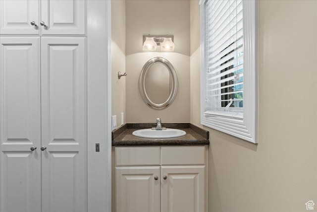 8022 S Deer Creek Rd E, Cottonwood Heights, UT 84121 - bathroom with vanity and a closet