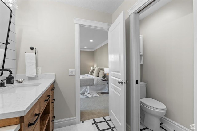 8022 S Deer Creek Rd E, Cottonwood Heights, UT 84121 - bathroom with connected bathroom, vanity, tile patterned floors, ornamental molding, and recessed lighting