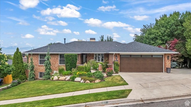 8022 S Deer Creek Rd E, Cottonwood Heights, UT 84121 - ranch-style house featuring a garage, concrete driveway, brick siding, a front lawn, and a chimney