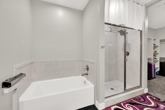 1016 N Vista Loop, Morgan, UT 84050 - bathroom with a garden tub, a shower stall, and a walk in closet