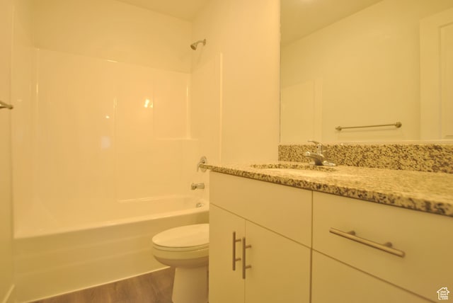 1183 W 1820 S, Logan, UT 84321 - bathroom featuring vanity, bathtub / shower combination, and wood finished floors