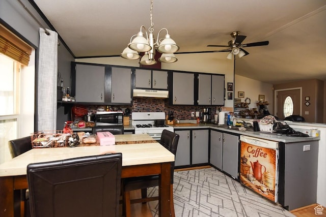 93 N Sherman St, Stockton, UT 84071 - kitchen with under cabinet range hood, stainless steel microwave, a peninsula, white gas stove, and lofted ceiling
