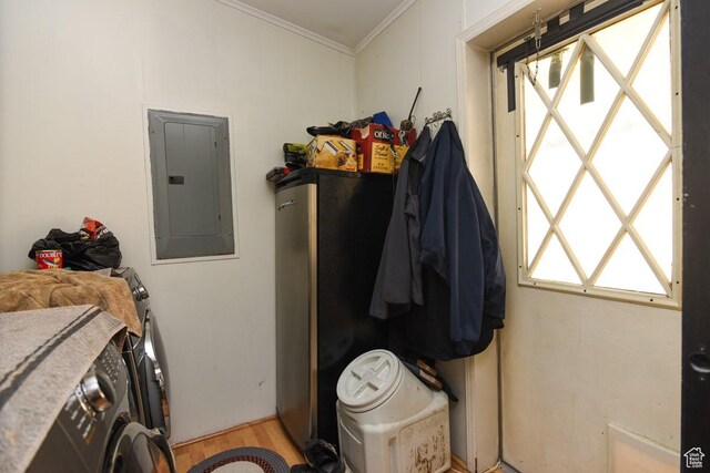 93 N Sherman St, Stockton, UT 84071 - washroom with electric panel, separate washer and dryer, ornamental molding, and light wood-type flooring