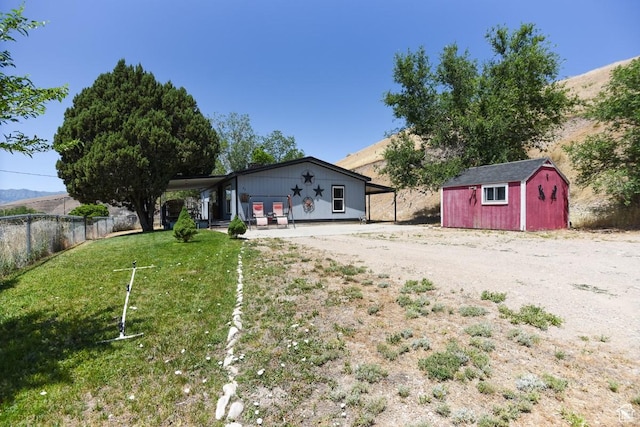 93 N Sherman St, Stockton, UT 84071 - view of front facade featuring a storage shed