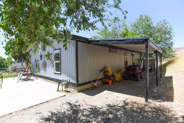 93 N Sherman St, Stockton, UT 84071 - back of house with an attached carport