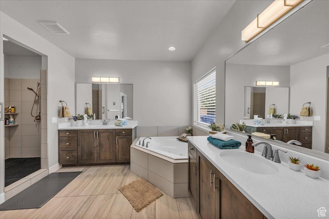 2811 S 3210 E, St George, UT 84790 - full bath with tiled shower, two vanities, and a tub with jets