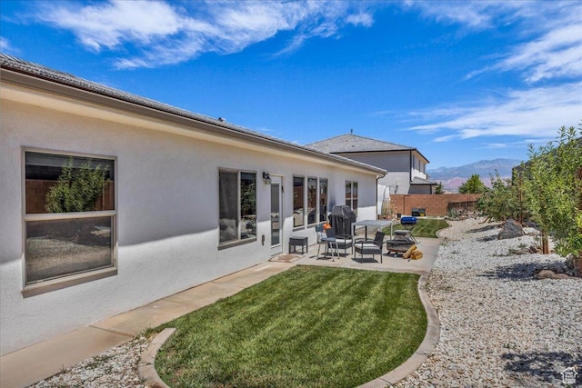 2811 S 3210 E, St George, UT 84790 - back of house featuring a patio area, stucco siding, and a mountain view