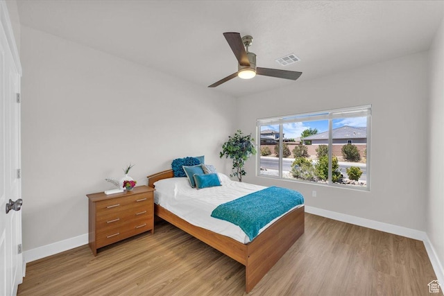 2811 S 3210 E, St George, UT 84790 - bedroom with light wood-type flooring and ceiling fan