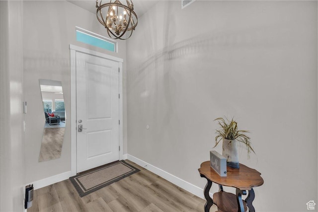 2811 S 3210 E, St George, UT 84790 - foyer entrance with light wood-type flooring and a chandelier