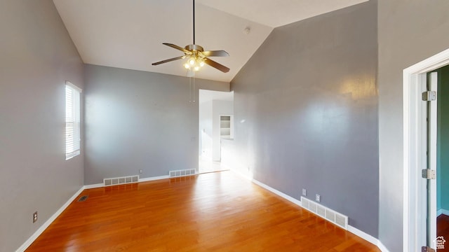 13333 S Alonzo Ln W, Herriman, UT 84096 - empty room featuring a ceiling fan, wood finished floors, and high vaulted ceiling