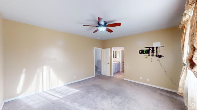 13333 S Alonzo Ln W, Herriman, UT 84096 - unfurnished bedroom featuring light carpet, connected bathroom, and a ceiling fan