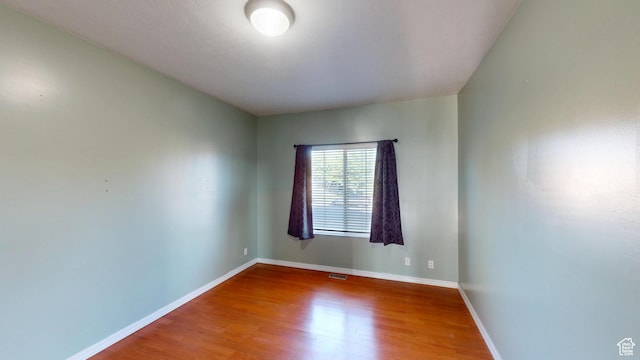 13333 S Alonzo Ln W, Herriman, UT 84096 - empty room featuring wood finished floors and baseboards
