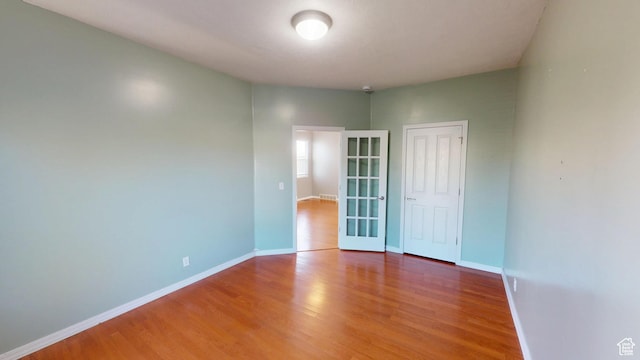 13333 S Alonzo Ln W, Herriman, UT 84096 - empty room featuring wood finished floors and baseboards