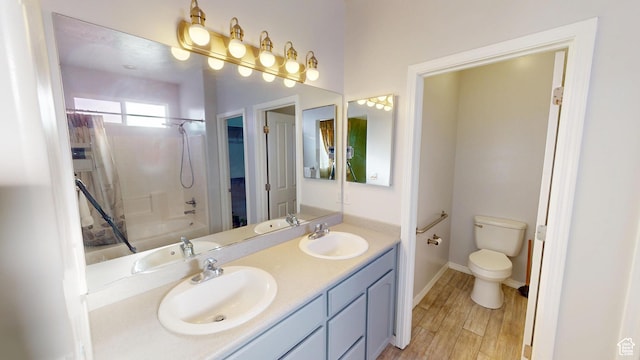 13333 S Alonzo Ln W, Herriman, UT 84096 - bathroom with double vanity, shower / bath combo, and wood finished floors