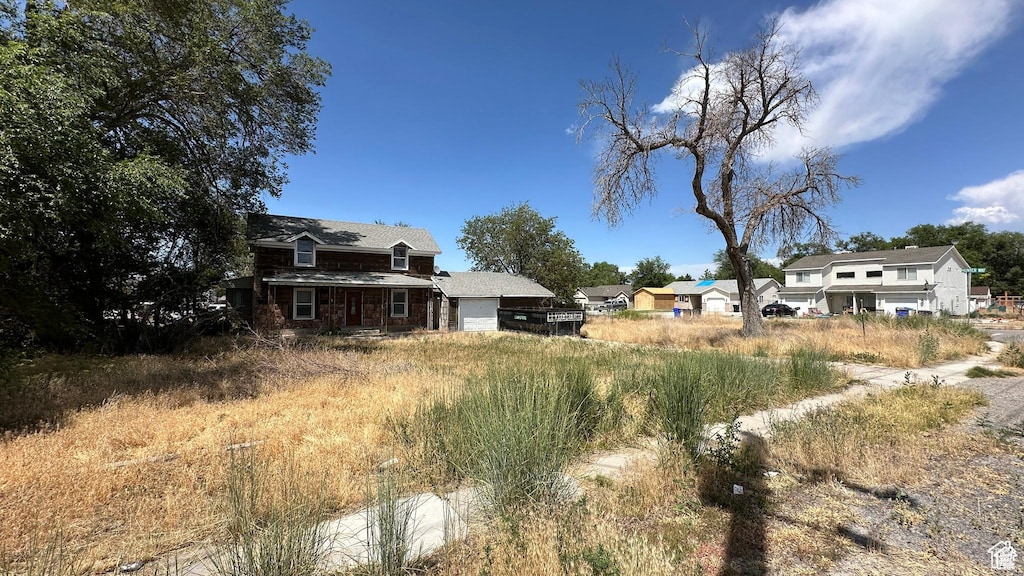 637 E Main St, Grantsville, UT 84029 - view of yard with a garage