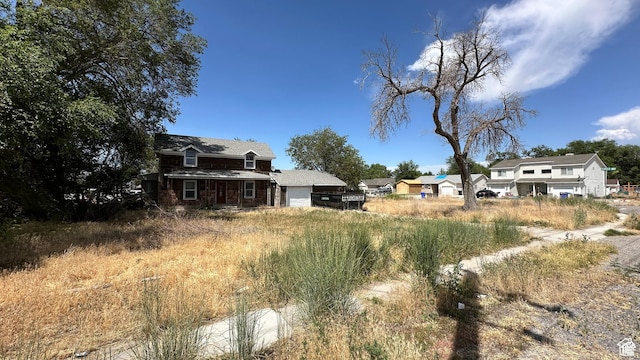 637 E Main St, Grantsville, UT 84029 - view of yard with a garage
