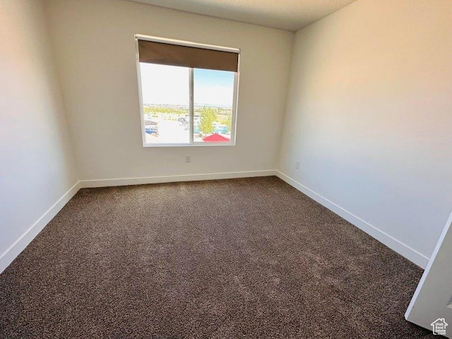 2944 W Ezra Dr, Cedar City, UT 84720 - spare room featuring dark colored carpet