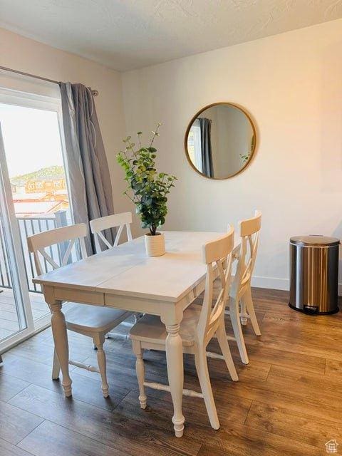 2944 W Ezra Dr, Cedar City, UT 84720 - dining area featuring wood finished floors and baseboards