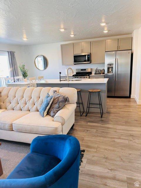 2944 W Ezra Dr, Cedar City, UT 84720 - living area with light wood-type flooring and recessed lighting