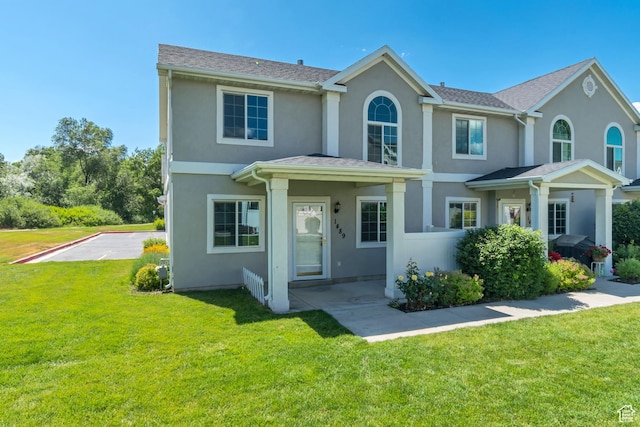 1489 S Silver Maple Ct, Payson, UT 84651 - view of front of home with stucco siding and a front lawn