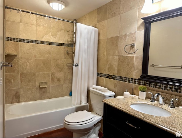 963 E 800 S Unit 106, Salt Lake City, UT 84102 - bathroom with tile walls, shower / bath combination with curtain, vanity, and decorative backsplash