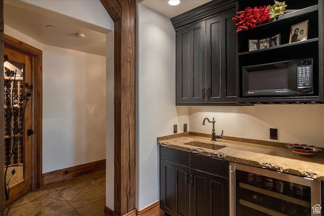 2711 E Bitter Brush Dr, Park City, UT 84098 - indoor wet bar featuring black microwave and beverage cooler