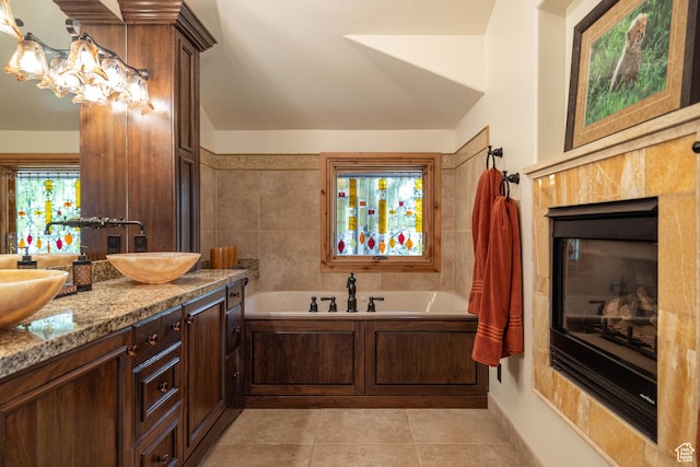 2711 E Bitter Brush Dr, Park City, UT 84098 - full bathroom with a garden tub, double vanity, and tile patterned flooring