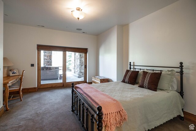 2711 E Bitter Brush Dr, Park City, UT 84098 - carpeted bedroom with access to exterior and baseboards