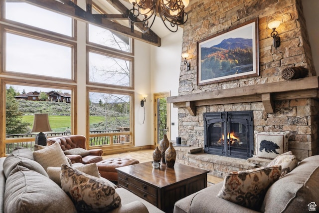 2711 E Bitter Brush Dr, Park City, UT 84098 - living area featuring high vaulted ceiling, a chandelier, wood finished floors, and a fireplace