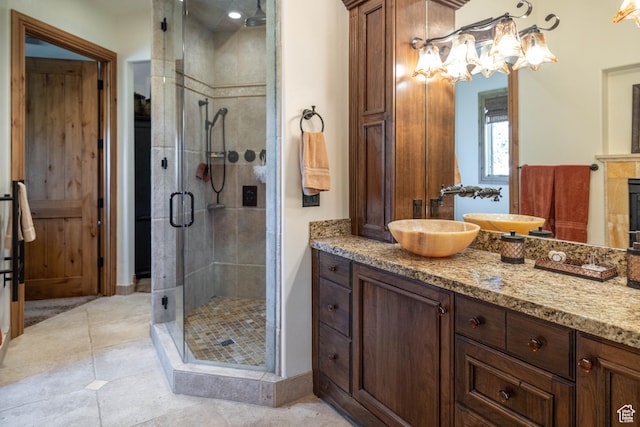 2711 E Bitter Brush Dr, Park City, UT 84098 - full bath featuring a shower stall, vanity, tile patterned flooring, and a chandelier