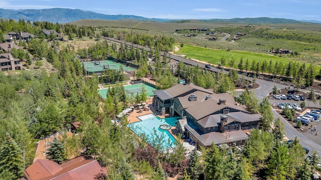 2711 E Bitter Brush Dr, Park City, UT 84098 - drone / aerial view of a pool and a mountainous background