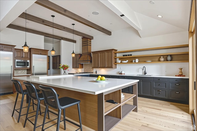 2711 E Bitter Brush Dr, Park City, UT 84098 - kitchen featuring open shelves, stainless steel appliances, custom exhaust hood, backsplash, and beamed ceiling