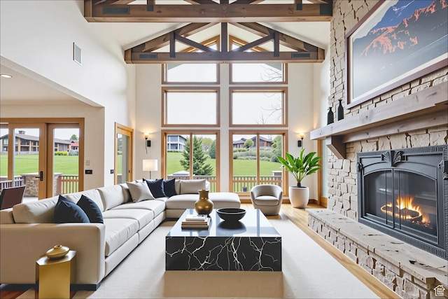 2711 E Bitter Brush Dr, Park City, UT 84098 - living area featuring high vaulted ceiling, a fireplace, and beam ceiling