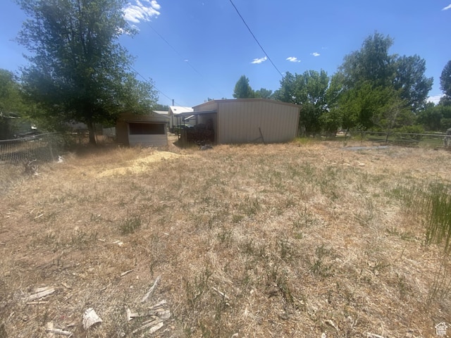 229 E 400 N, Duchesne, UT 84021 - view of yard with an outdoor structure and an outbuilding