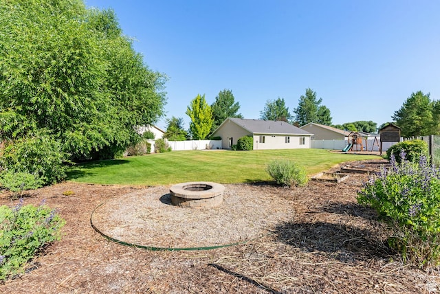 888 S Mallard Loop W, Logan, UT 84321 - view of yard featuring a playground and a fire pit