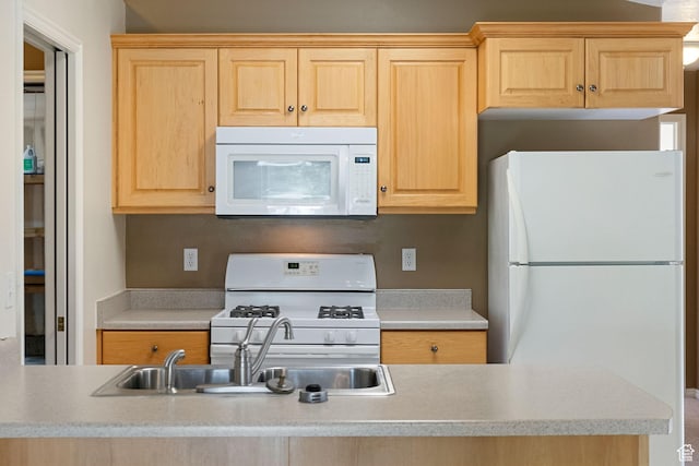 888 S Mallard Loop W, Logan, UT 84321 - kitchen with white appliances, light brown cabinets, and light countertops