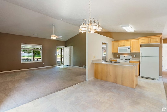 888 S Mallard Loop W, Logan, UT 84321 - kitchen with white appliances, lofted ceiling, ceiling fan, open floor plan, and a peninsula