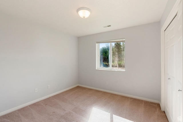 888 S Mallard Loop W, Logan, UT 84321 - unfurnished bedroom featuring light colored carpet and a closet