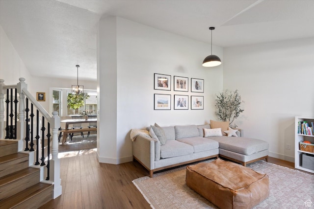 1153 N 280 W, American Fork, UT 84003 - living room with a chandelier, wood finished floors, and stairway