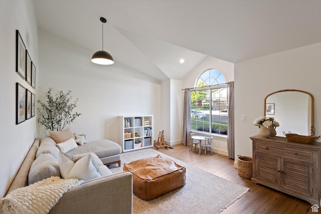 1153 N 280 W, American Fork, UT 84003 - living area featuring vaulted ceiling, wood finished floors, and recessed lighting